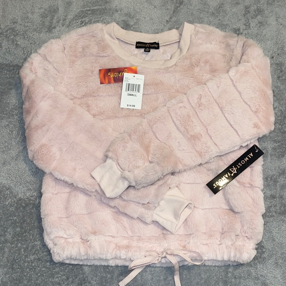 Almost Famous blush colored ladies top